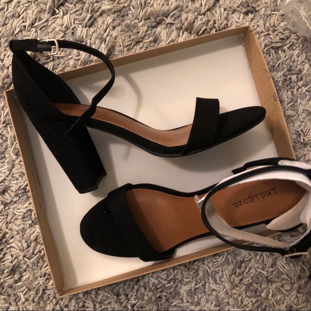 Never worn black strapped heels